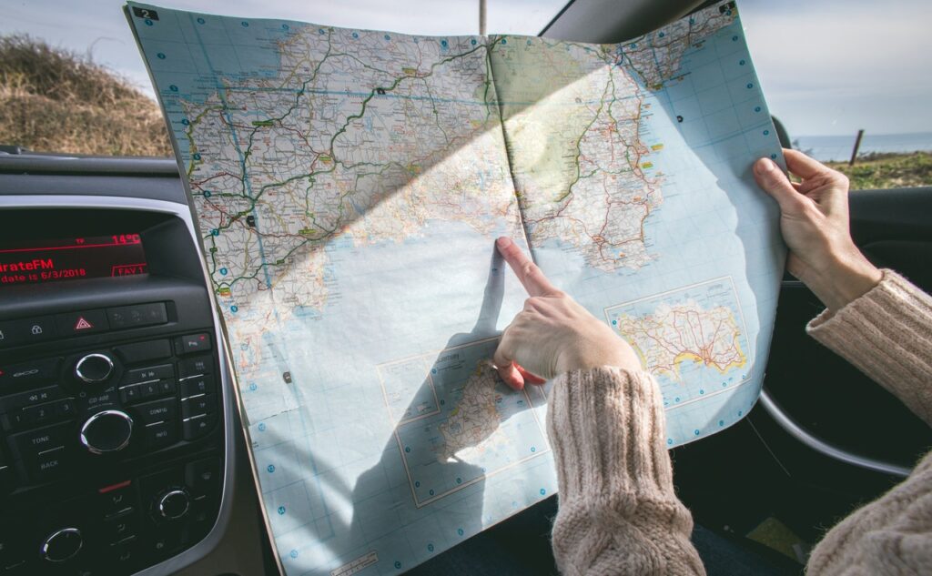 Person travelling with a map