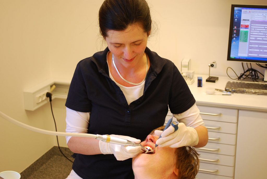 Dentist performing a root canal