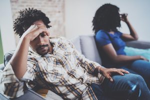 Young sad black couple.