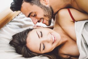 Happy romantic couple having sex.