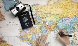Camera, passport and a map