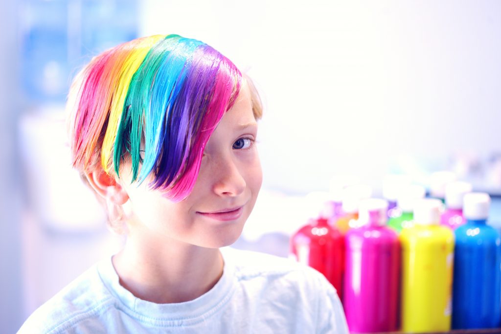 Young boy with different hair color