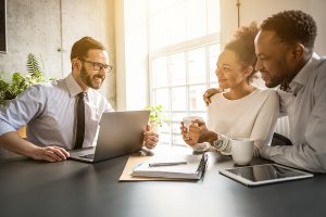 Couple consulting a property and home conveyancer