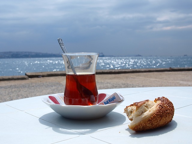 Simit food to try and tea in Istanbul on a table.