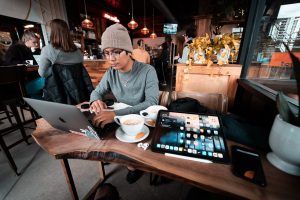 Restaurant owner working on his laptop