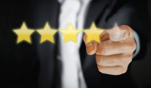 Man giving a four star review